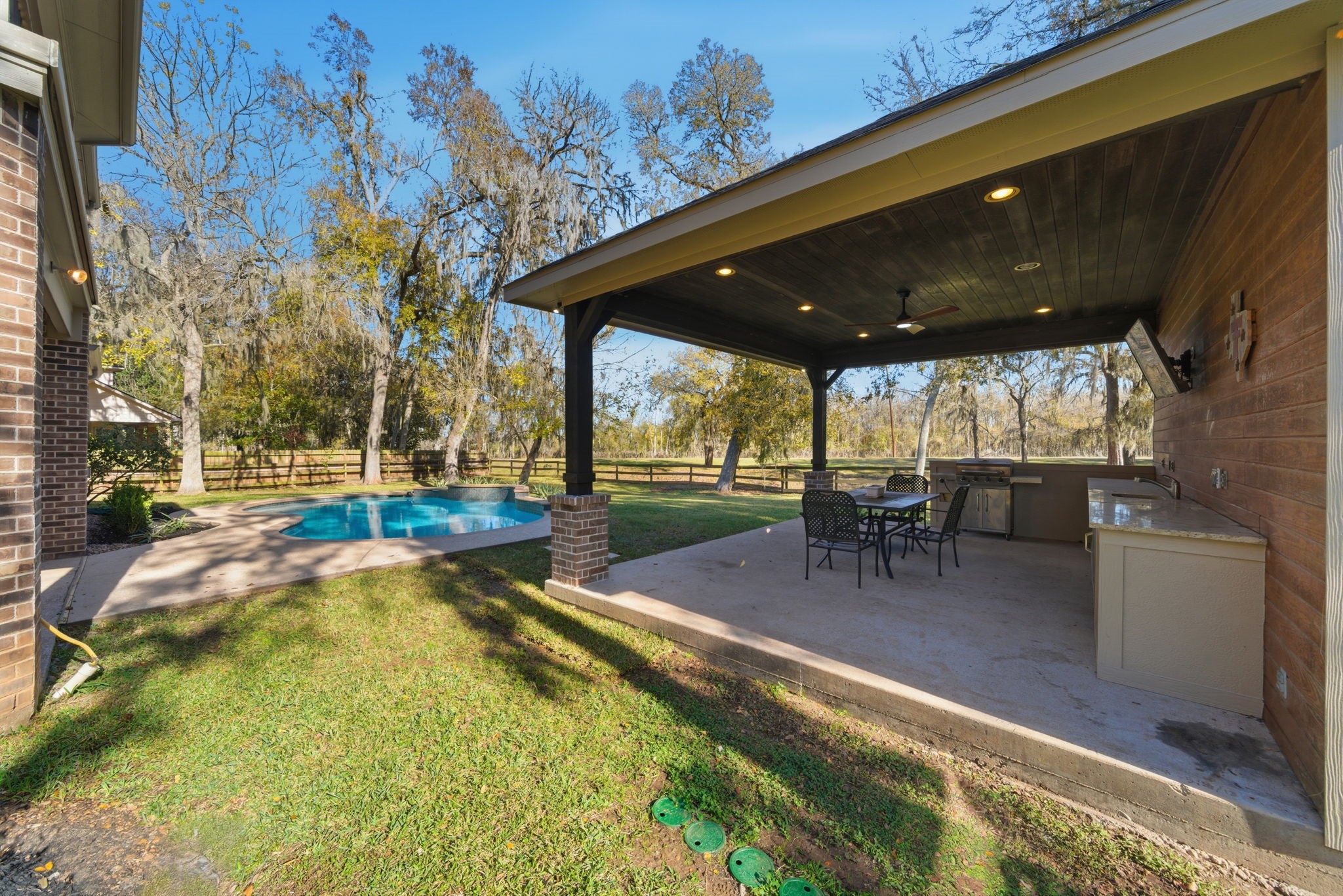 32807 Whitburn Trail Fulshear, TX 77441 - Photo 36 of 39 a view of a swimming pool with a patio