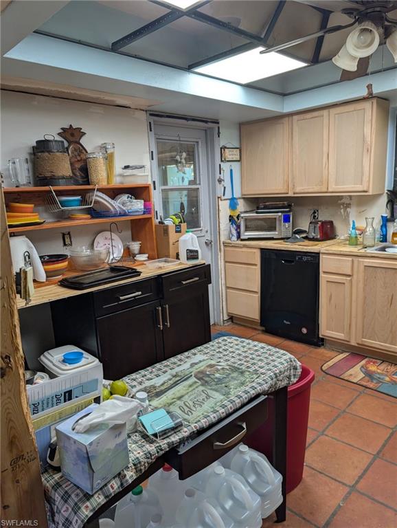 23261 Tuckahoe Road Alva, FL 33920 - Photo 20 of 39 a kitchen with kitchen island a sink stove and view of living room