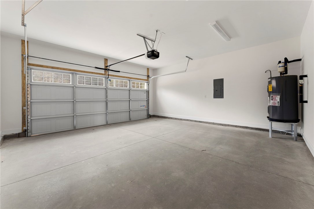 505 Fire Tower Road Williamston, SC 29697 - Photo 36 of 37 Spacious and clean, this garage offers ample room for vehicles and storage.