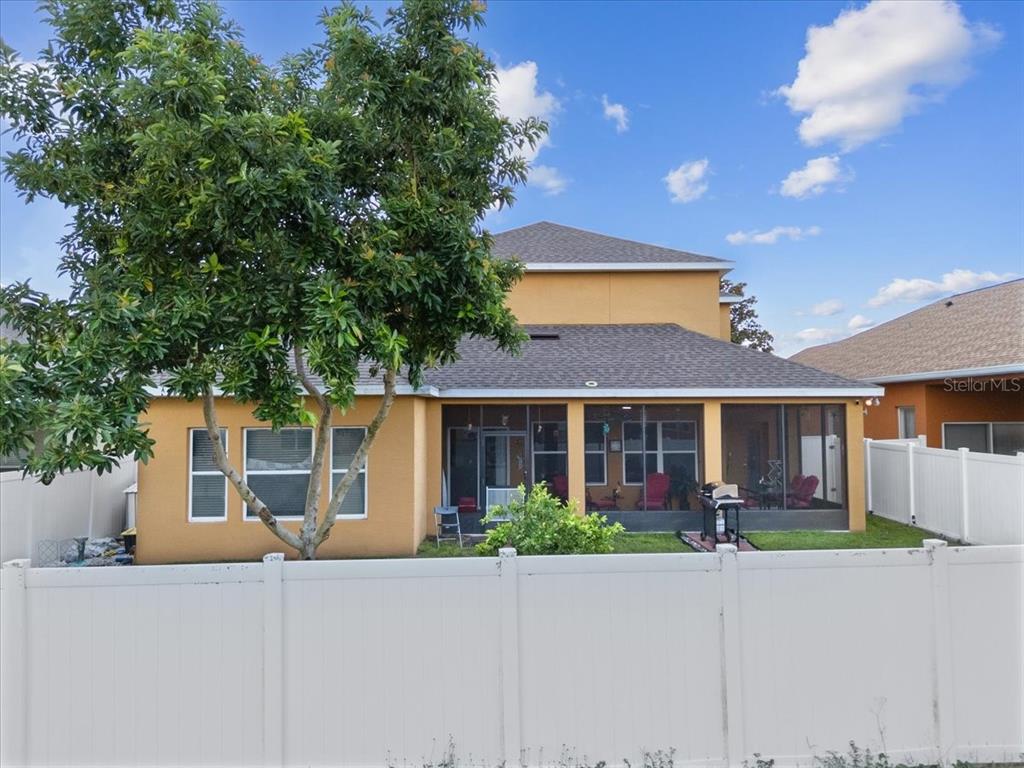817 James Way Lake Alfred, FL 33850 - Photo 12 of 69 front view of house with a small yard