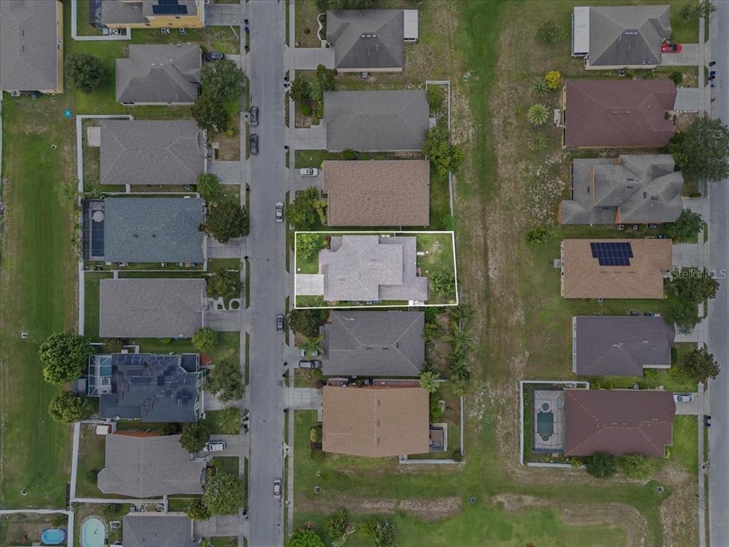 817 James Way Lake Alfred, FL 33850 - Photo 15 of 69 an aerial view of residential houses with outdoor space and parking