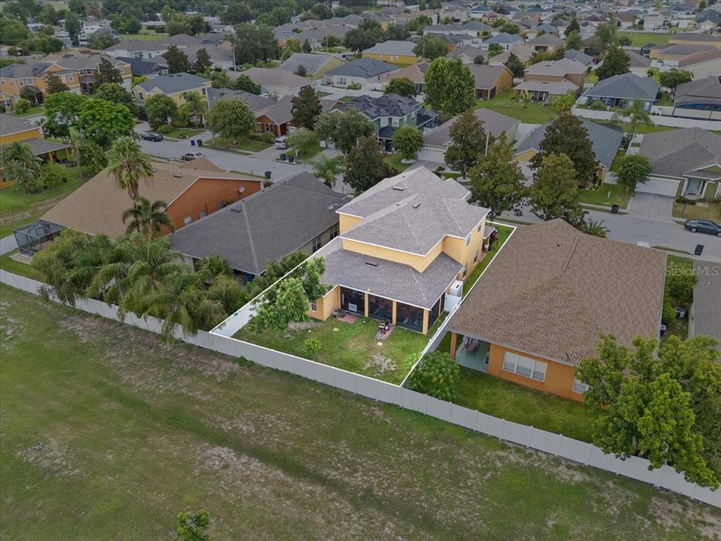 817 James Way Lake Alfred, FL 33850 - Photo 17 of 69 an aerial view of a house with a garden