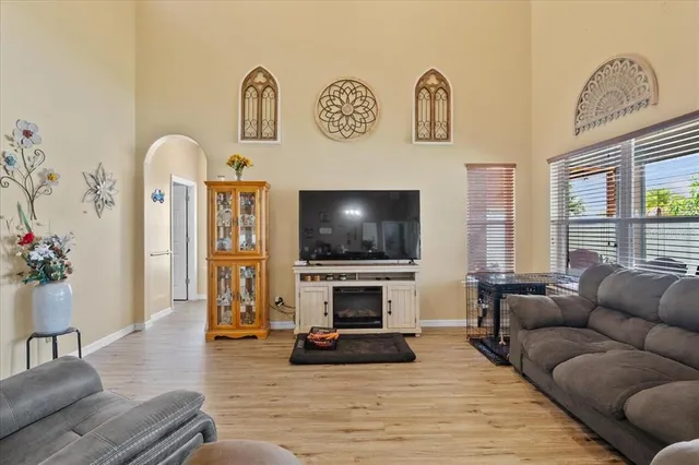 a white toilet sitting next to a white tub