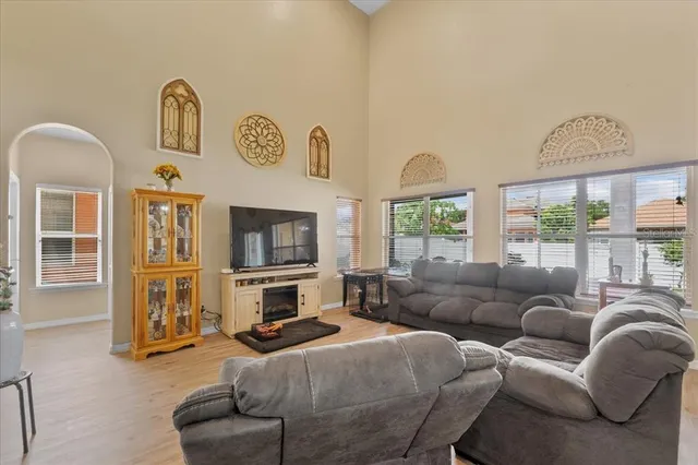 a view of walk in closet with clothes