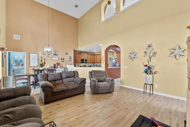 a view of walk in closet with clothes