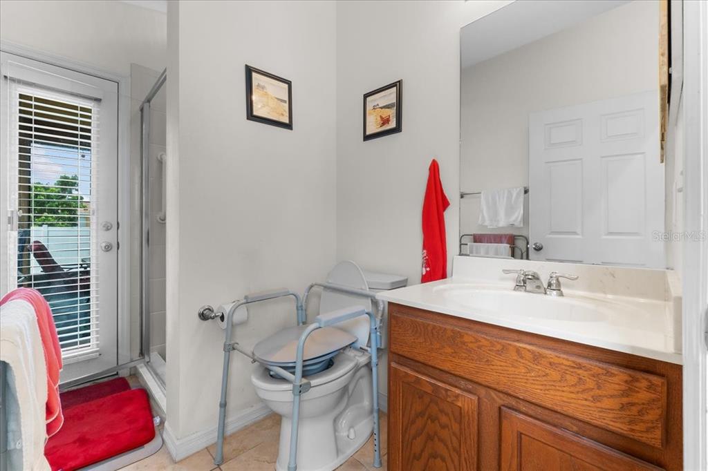 817 James Way Lake Alfred, FL 33850 - Photo 45 of 69 a bathroom with a sink and a mirror