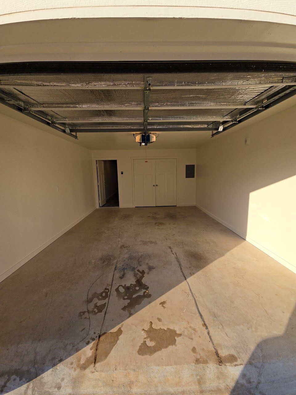 21155 Gosling Road, Unit 51A Spring, TX 77388 - Photo 32 of 34 one car garage - painted and comes with car remote, outside keypad and times to self close itself.