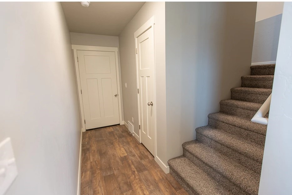 21155 Gosling Road, Unit 51A Spring, TX 77388 - Photo 5 of 34 hallway from living room to garage/upstairs