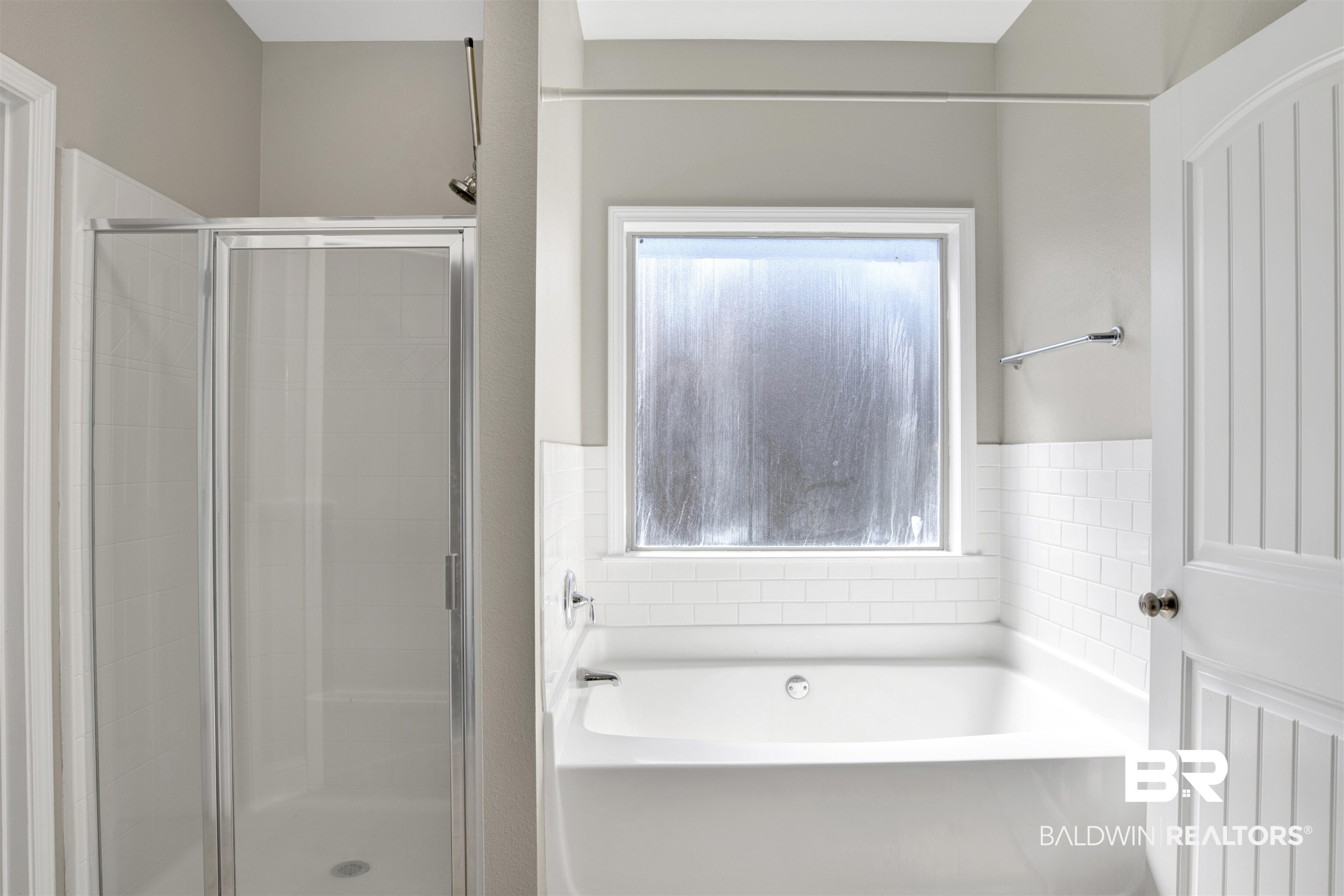 24159 Tullamore Drive Daphne, AL 36526 - Photo 23 of 31 Bathroom featuring shower with separate bathtub and a healthy amount of sunlight
