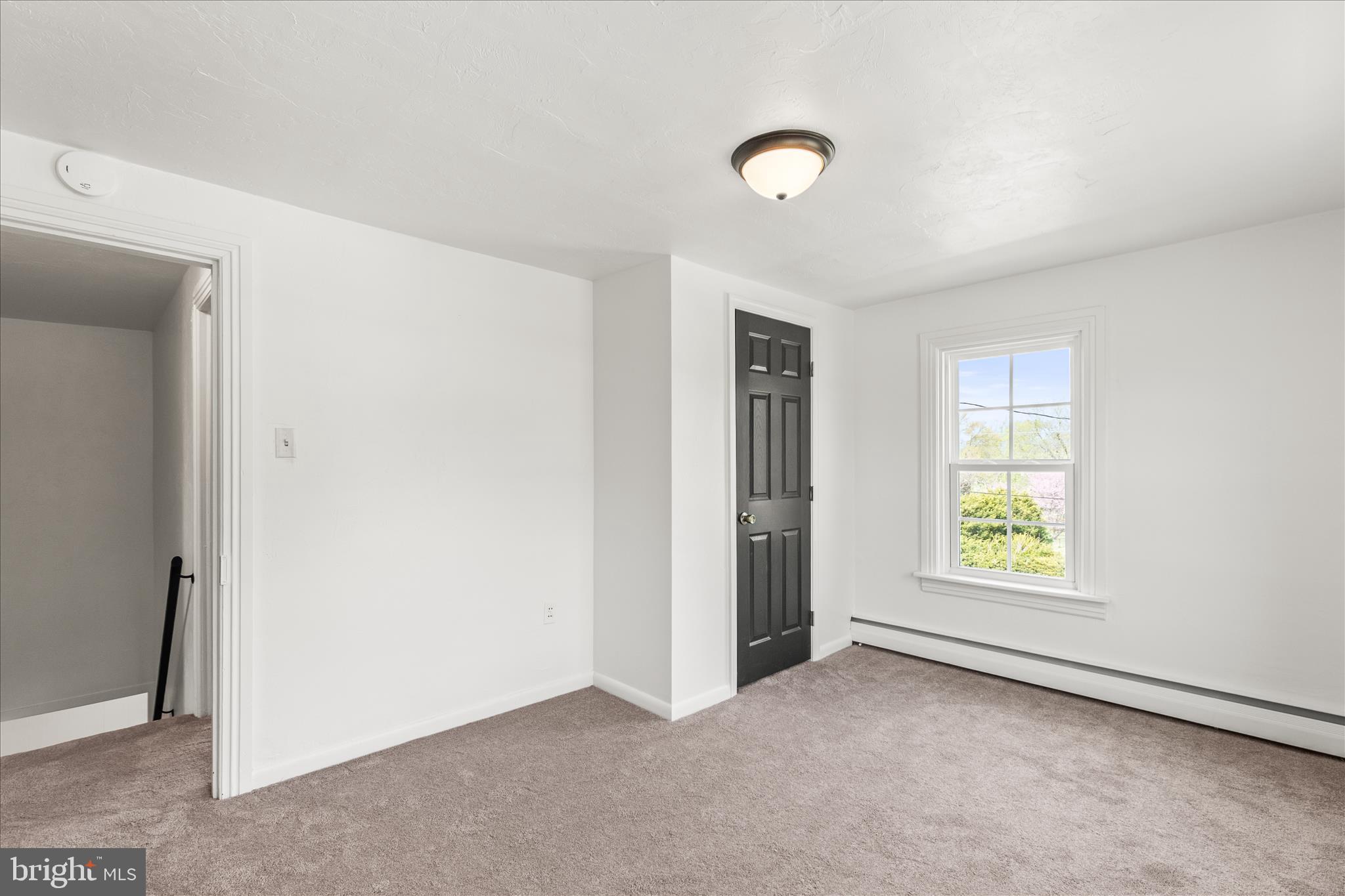 310 Clover Lane Hanover, PA 17331 - Photo 20 of 34 a view of an empty room with a window