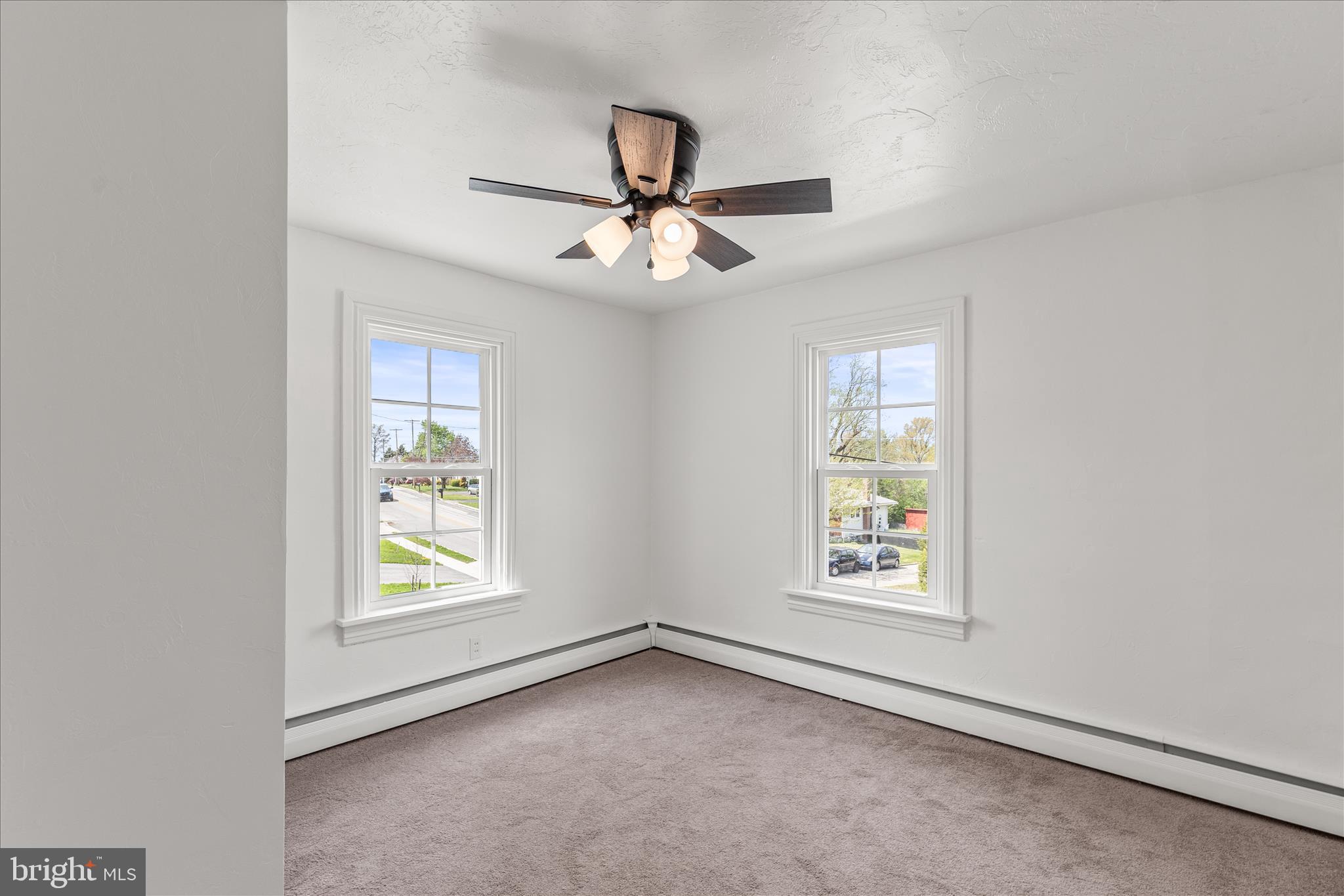 310 Clover Lane Hanover, PA 17331 - Photo 21 of 34 an empty room with windows and fan