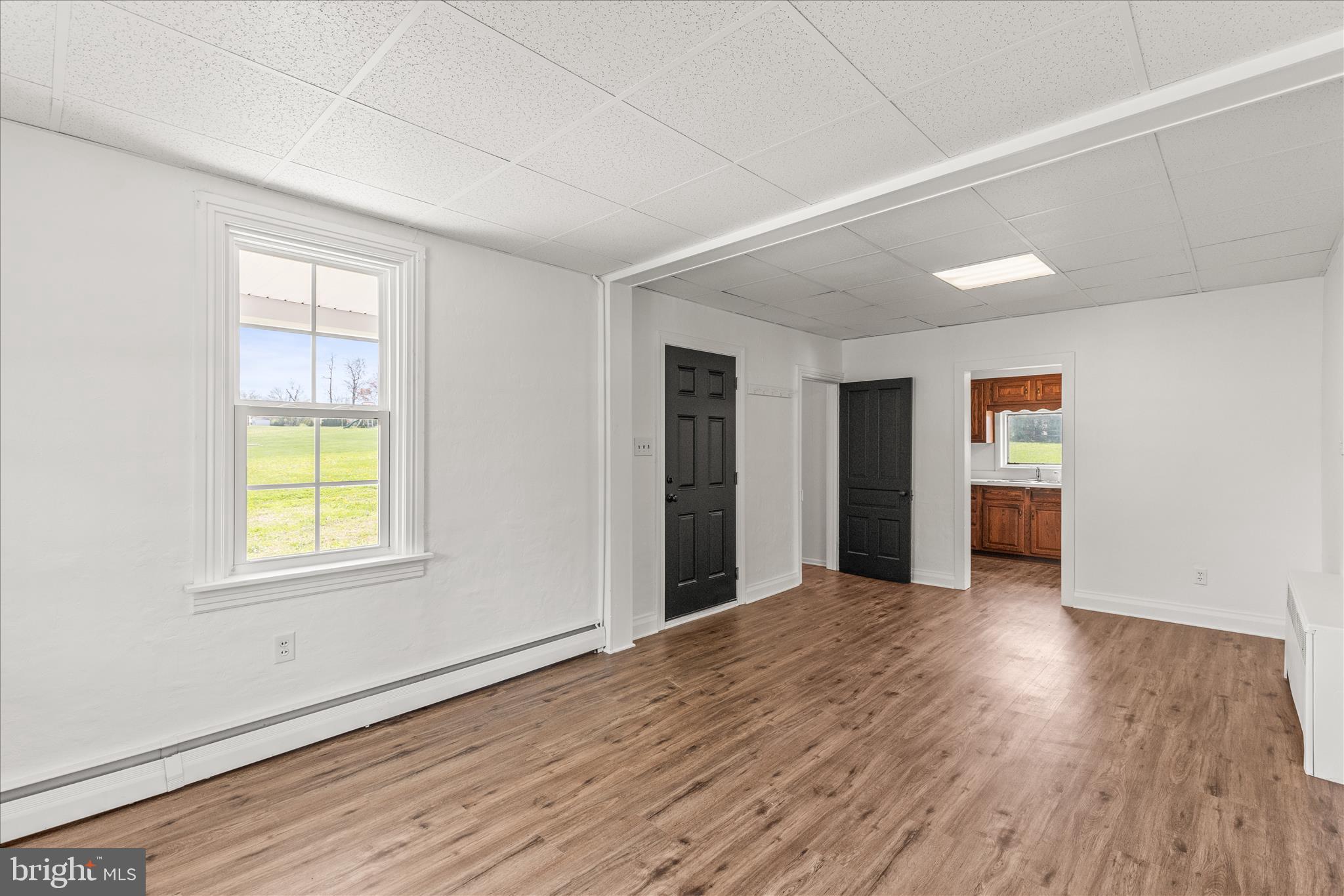 310 Clover Lane Hanover, PA 17331 - Photo 6 of 34 an empty room with wooden floor closet and windows