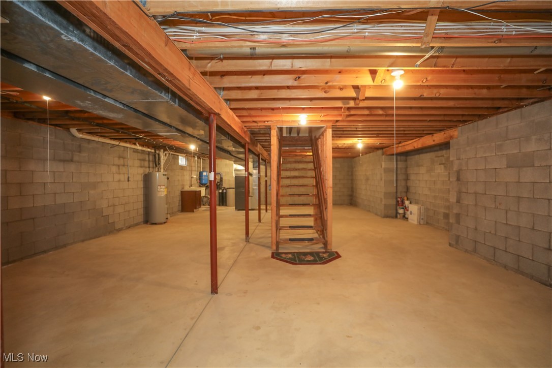 12565 Alpha Road Hiram, OH 44234 - Photo 39 of 50 Unfinished below grade area featuring heating unit and water heater