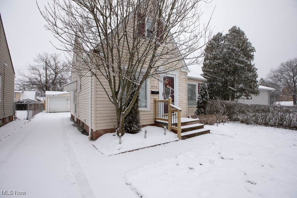 19310 Libby Road Maple Heights, OH 44137 - Photo 2 of 20 Bungalow-style home with an outbuilding and a garage