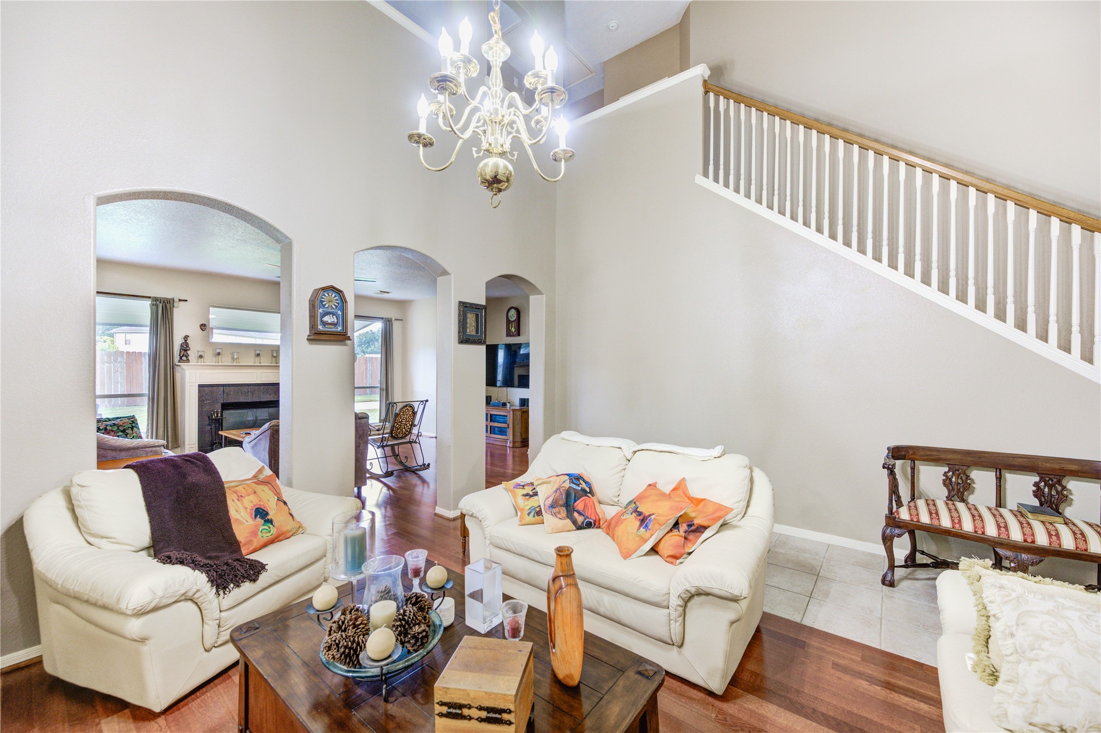 16730 Spring Barker Drive Cypress, TX 77429 - Photo 21 of 50 a living room with furniture and a chandelier