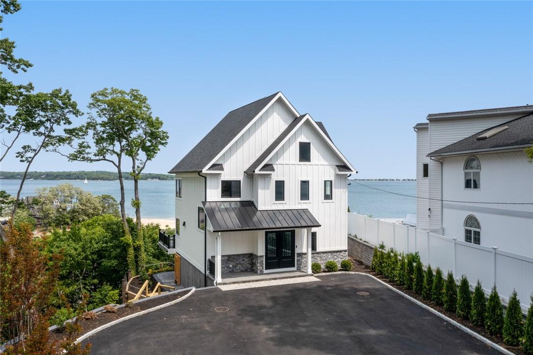 a view of a house with a yard and plants