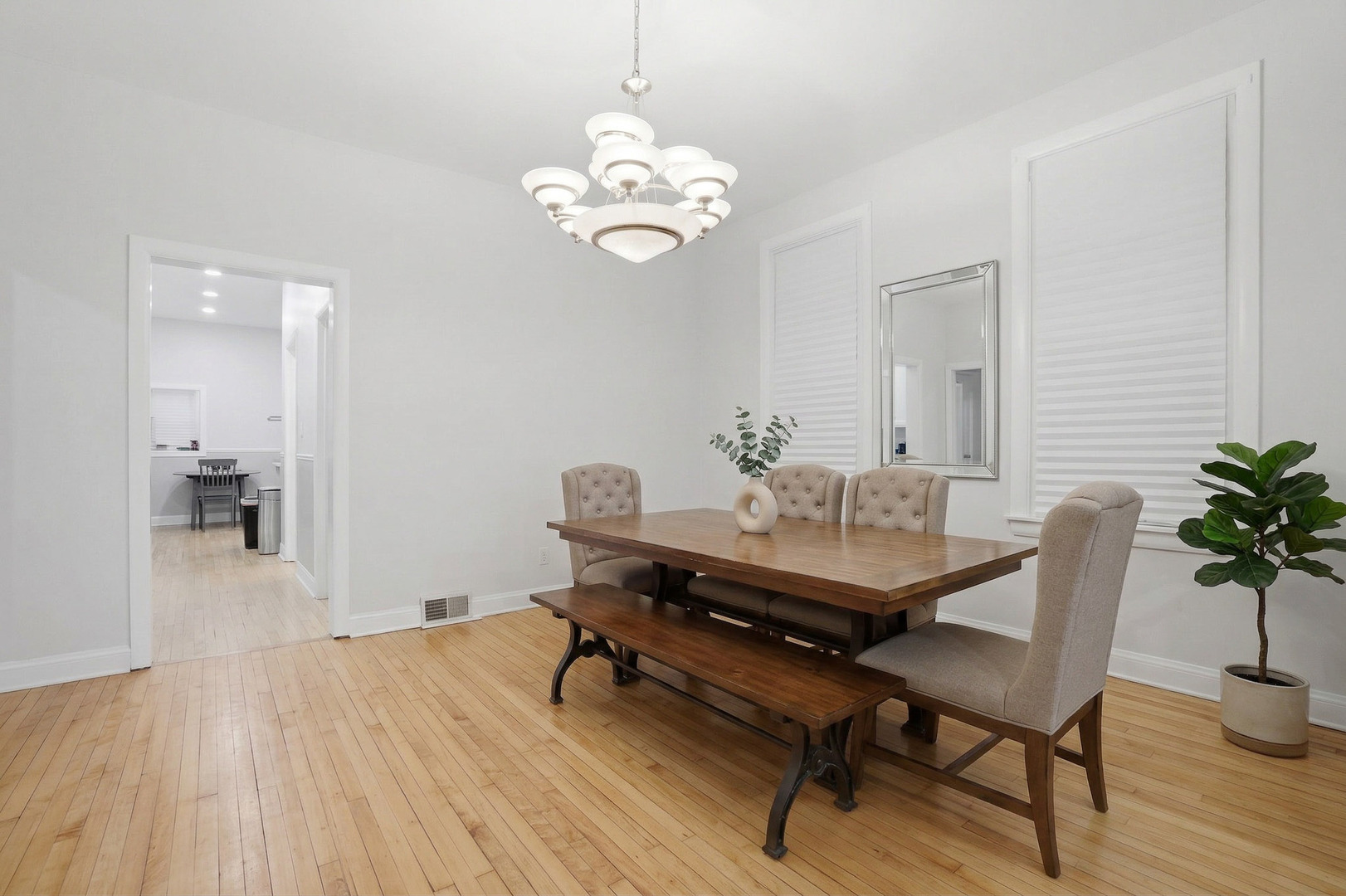 4327 North Avers Avenue Chicago, IL 60618 - Photo 14 of 33 a view of a dining room with furniture and wooden floor