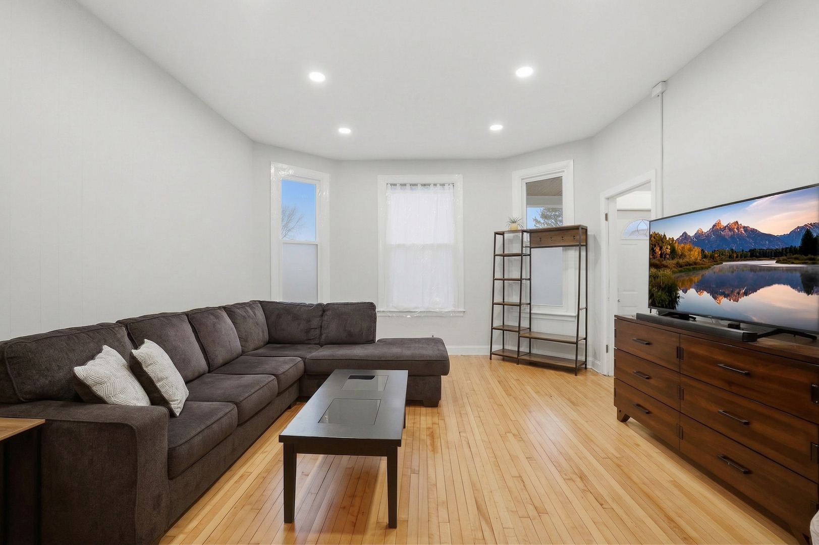 4327 North Avers Avenue Chicago, IL 60618 - Photo 15 of 33 a living room with furniture and wooden floor