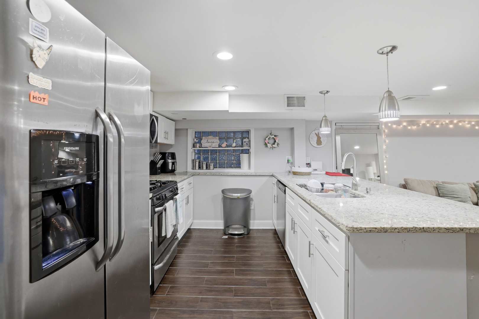 4327 North Avers Avenue Chicago, IL 60618 - Photo 20 of 33 a kitchen with counter top space and stainless steel appliances