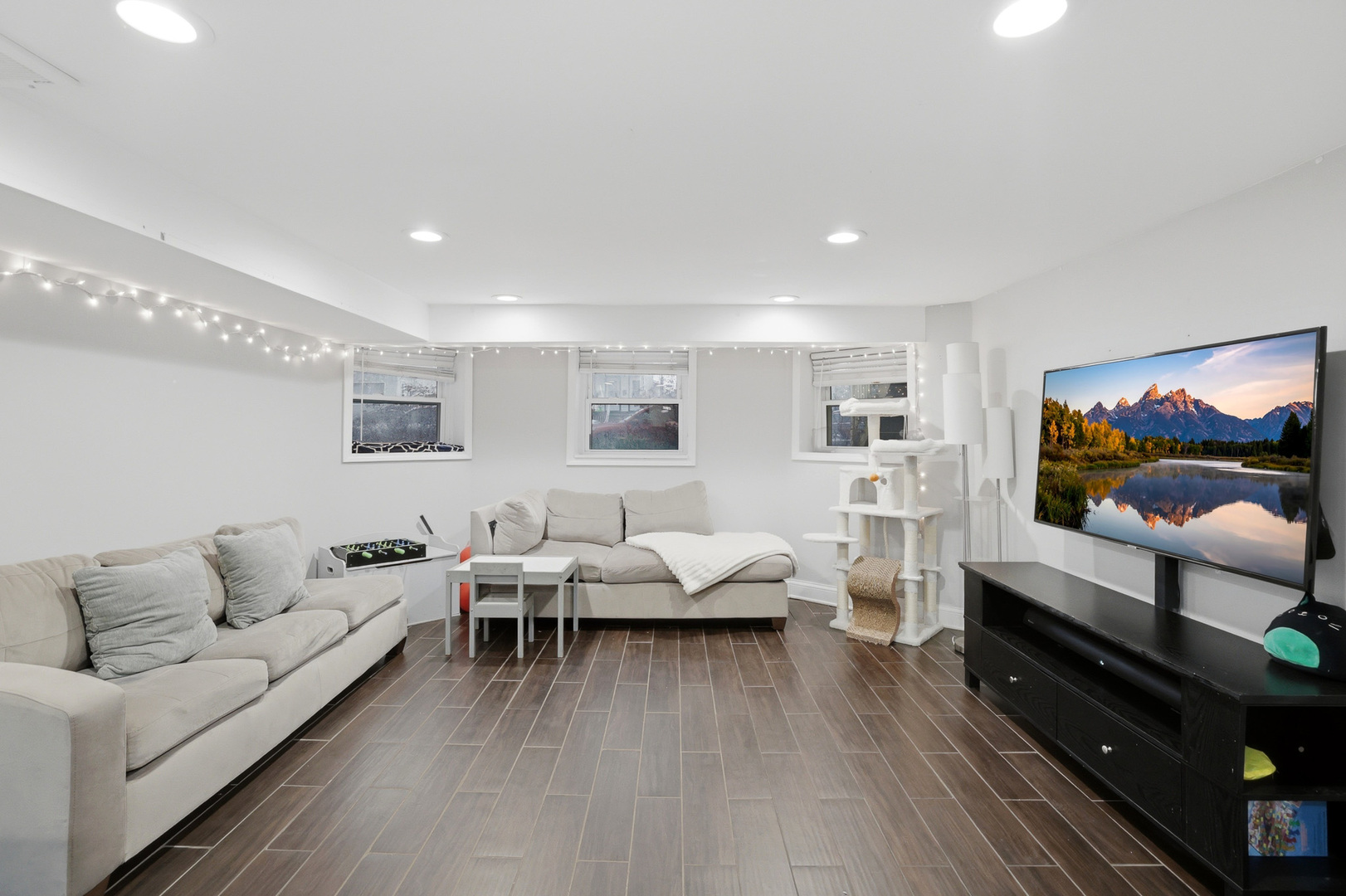 4327 North Avers Avenue Chicago, IL 60618 - Photo 22 of 33 a living room with furniture and wooden floor