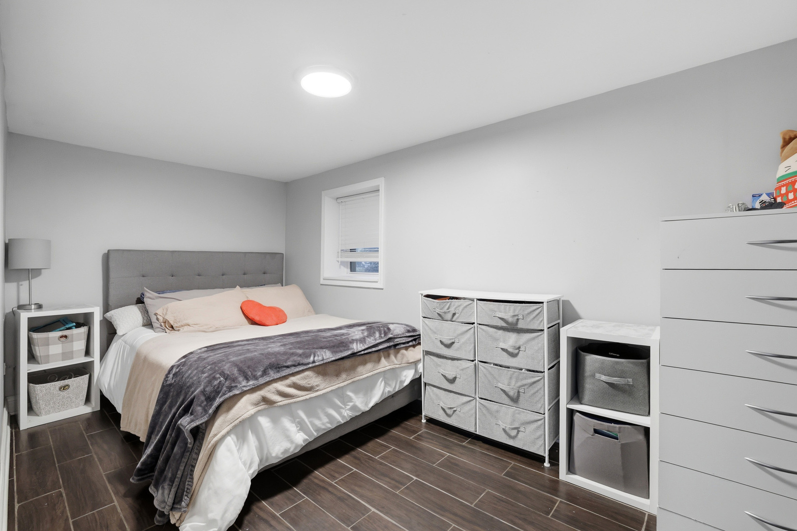 4327 North Avers Avenue Chicago, IL 60618 - Photo 24 of 33 a bedroom with a bed and a dresser