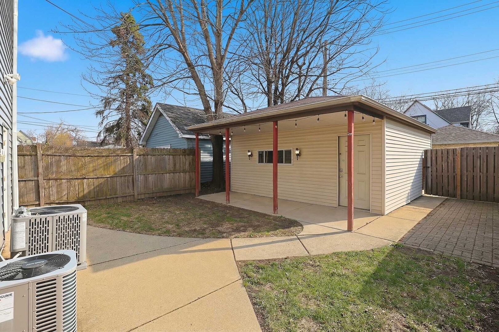 4327 North Avers Avenue Chicago, IL 60618 - Photo 27 of 33 a front view of a house with a yard