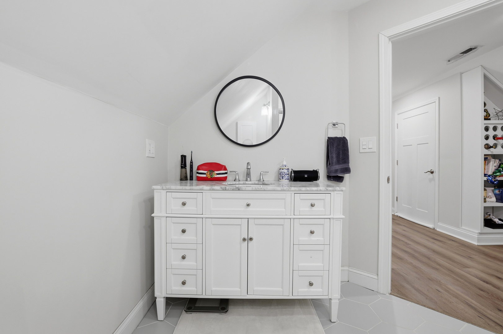 4327 North Avers Avenue Chicago, IL 60618 - Photo 33 of 33 a bathroom with a sink vanity and a mirror