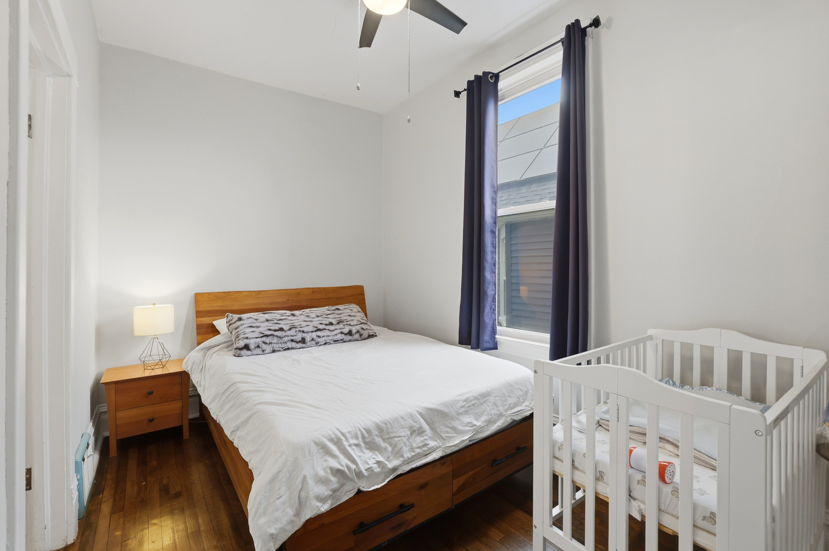4327 North Avers Avenue Chicago, IL 60618 - Photo 10 of 33 a bedroom with a bed and a window