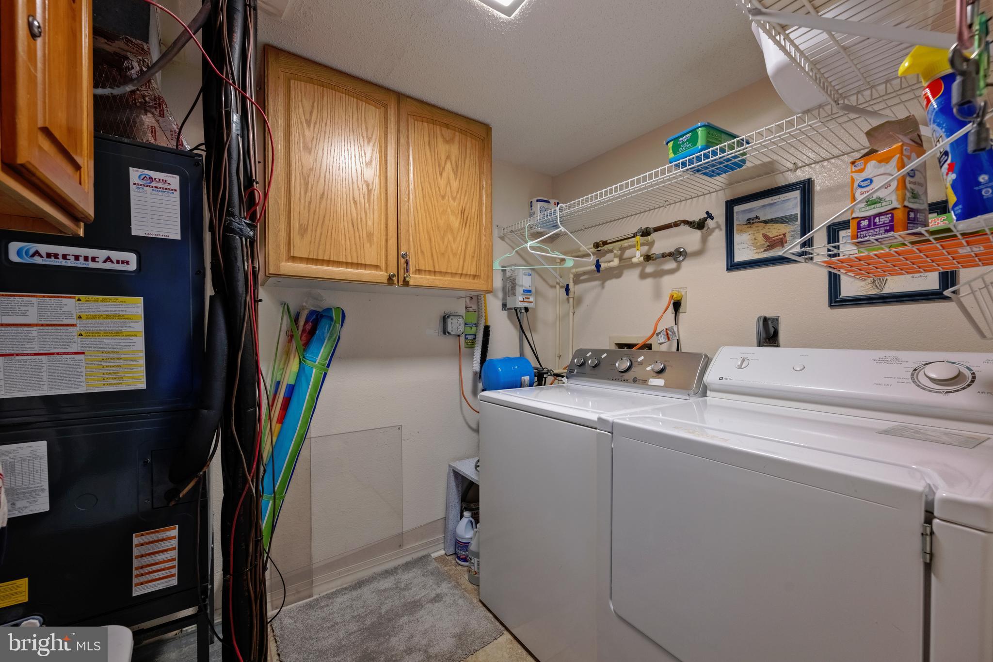 5 77th Street, Unit 404 Ocean City, MD 21842 - Photo 26 of 28 a view of storage and utility room