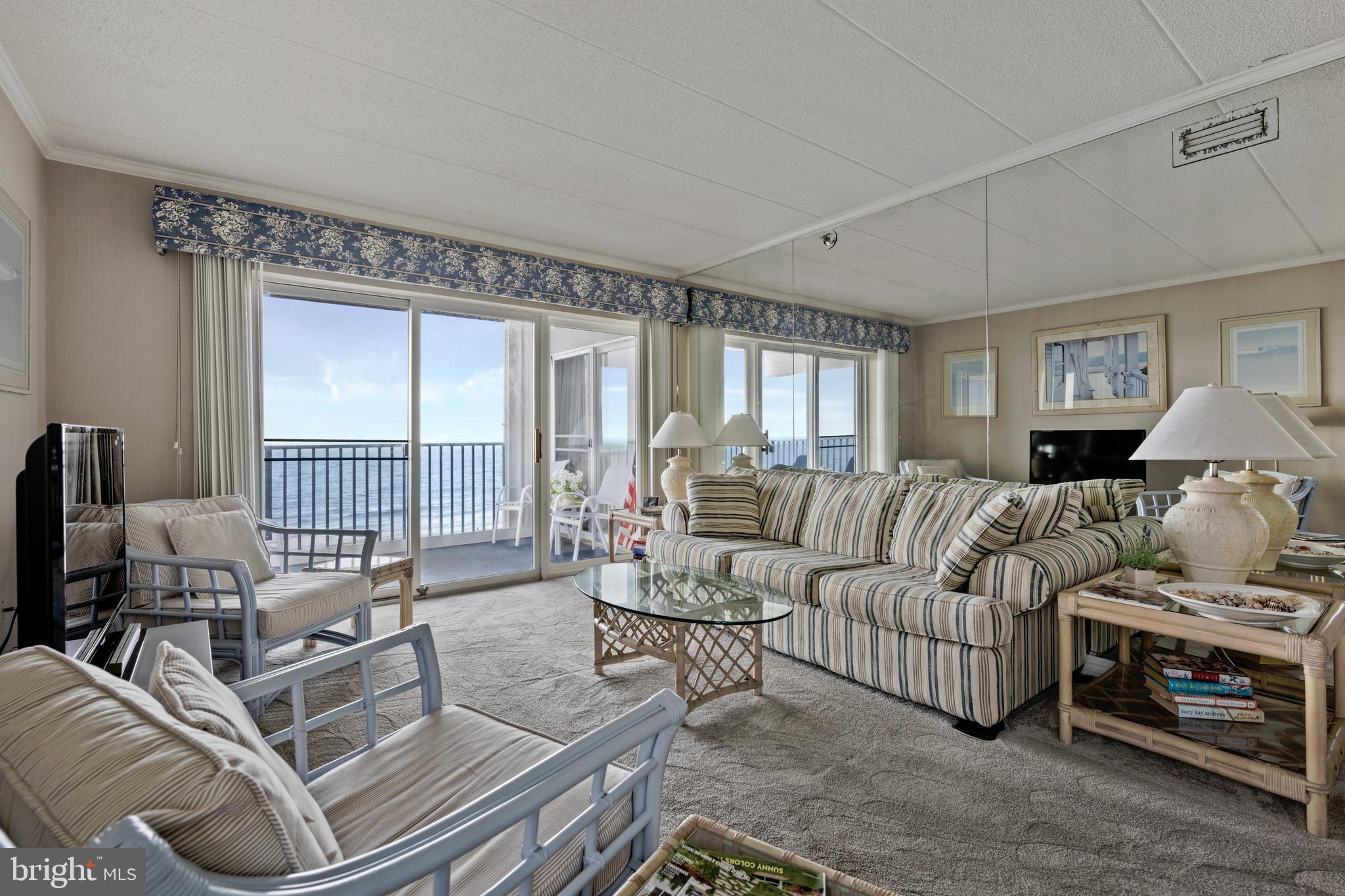 5 77th Street, Unit 404 Ocean City, MD 21842 - Photo 9 of 28 a living room with furniture and a flat screen tv