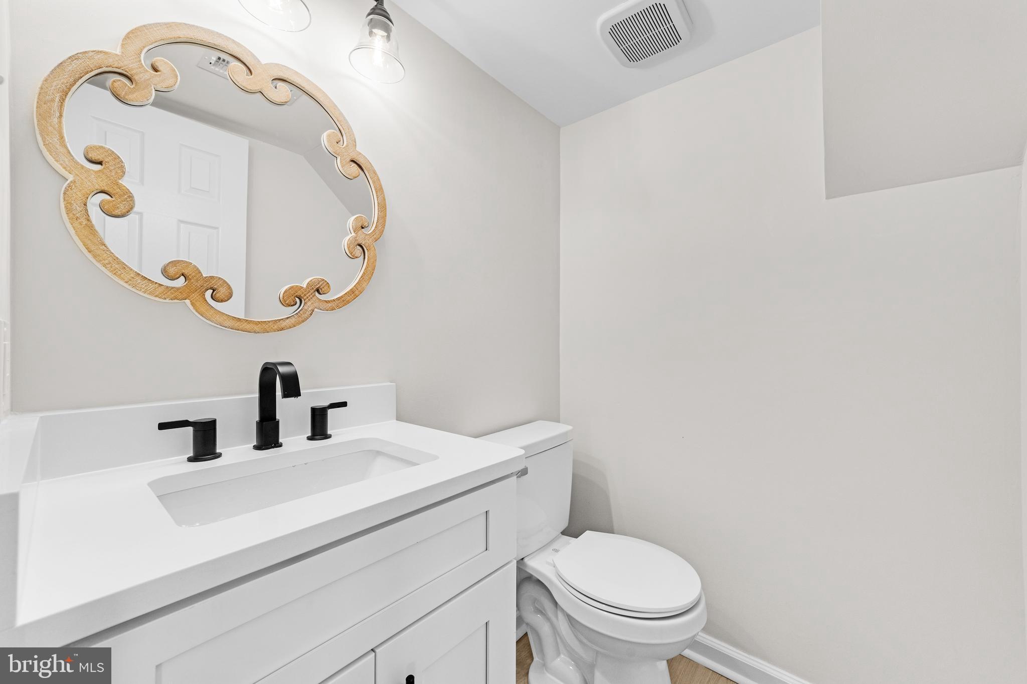 15 Dunlin Way Sicklerville, NJ 08081 - Photo 15 of 28 a bathroom with a sink and a mirror