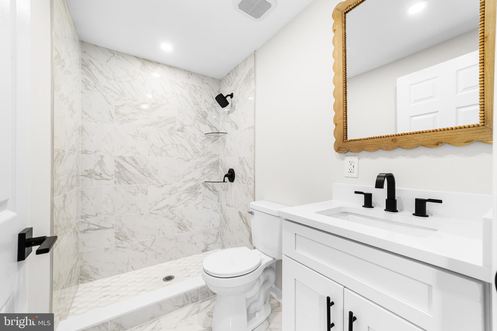 15 Dunlin Way Sicklerville, NJ 08081 - Photo 20 of 28 a bathroom with a sink toilet and shower