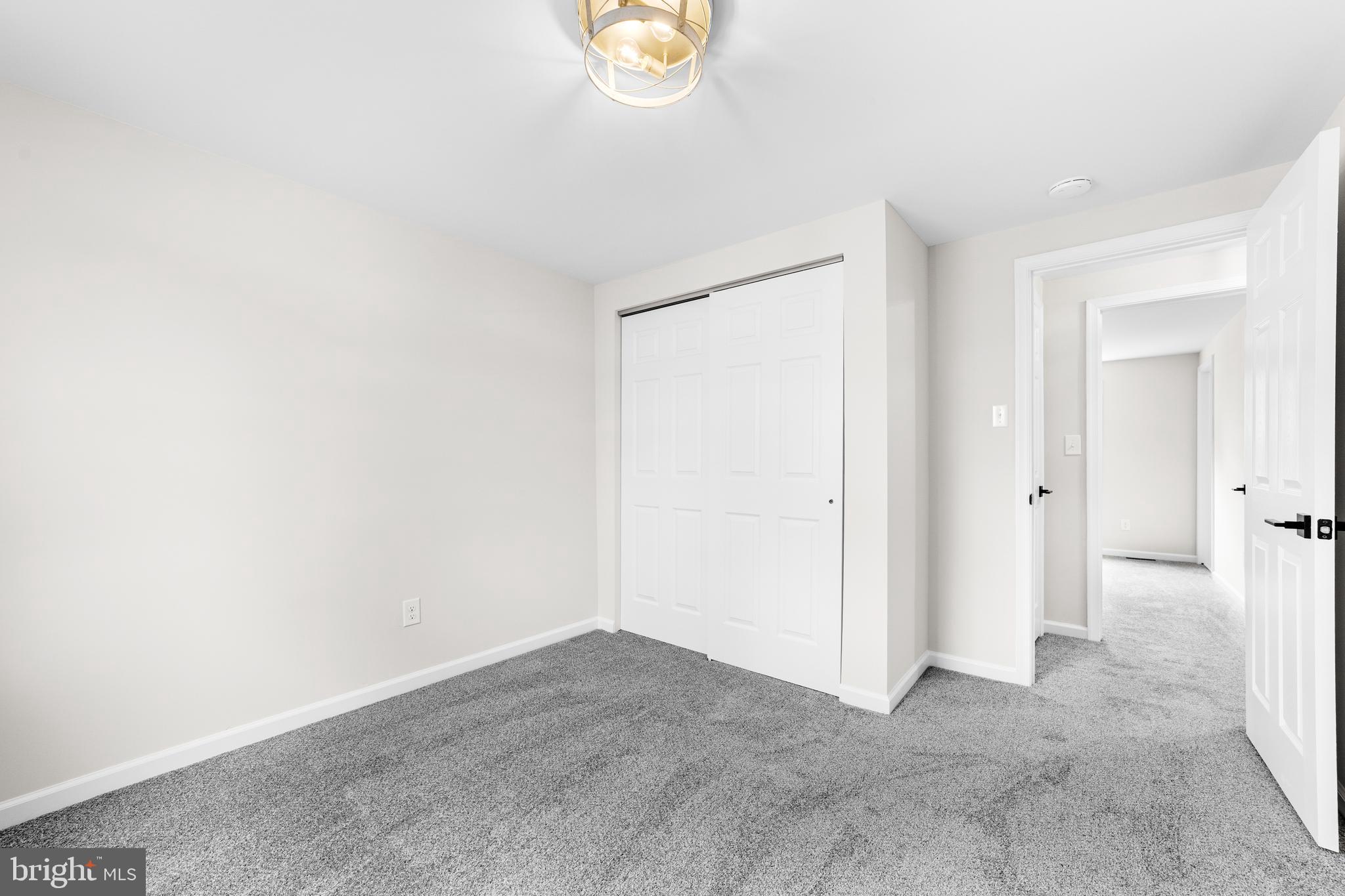 15 Dunlin Way Sicklerville, NJ 08081 - Photo 22 of 28 an empty room with windows and closet