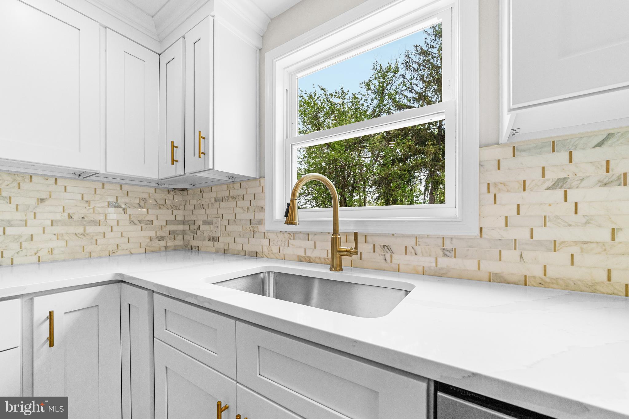 15 Dunlin Way Sicklerville, NJ 08081 - Photo 5 of 28 a kitchen with a sink cabinets and window
