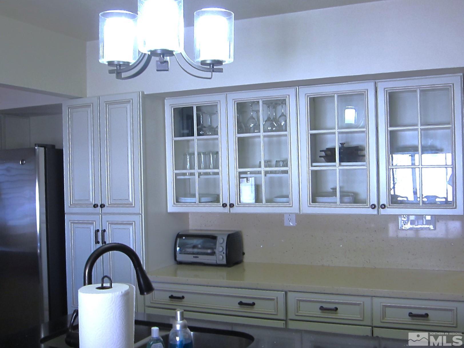 16770 Mt Rose Highway, Unit A & B Reno, NV 89511 - Photo 16 of 40 a close view of a kitchen sink and cabinets