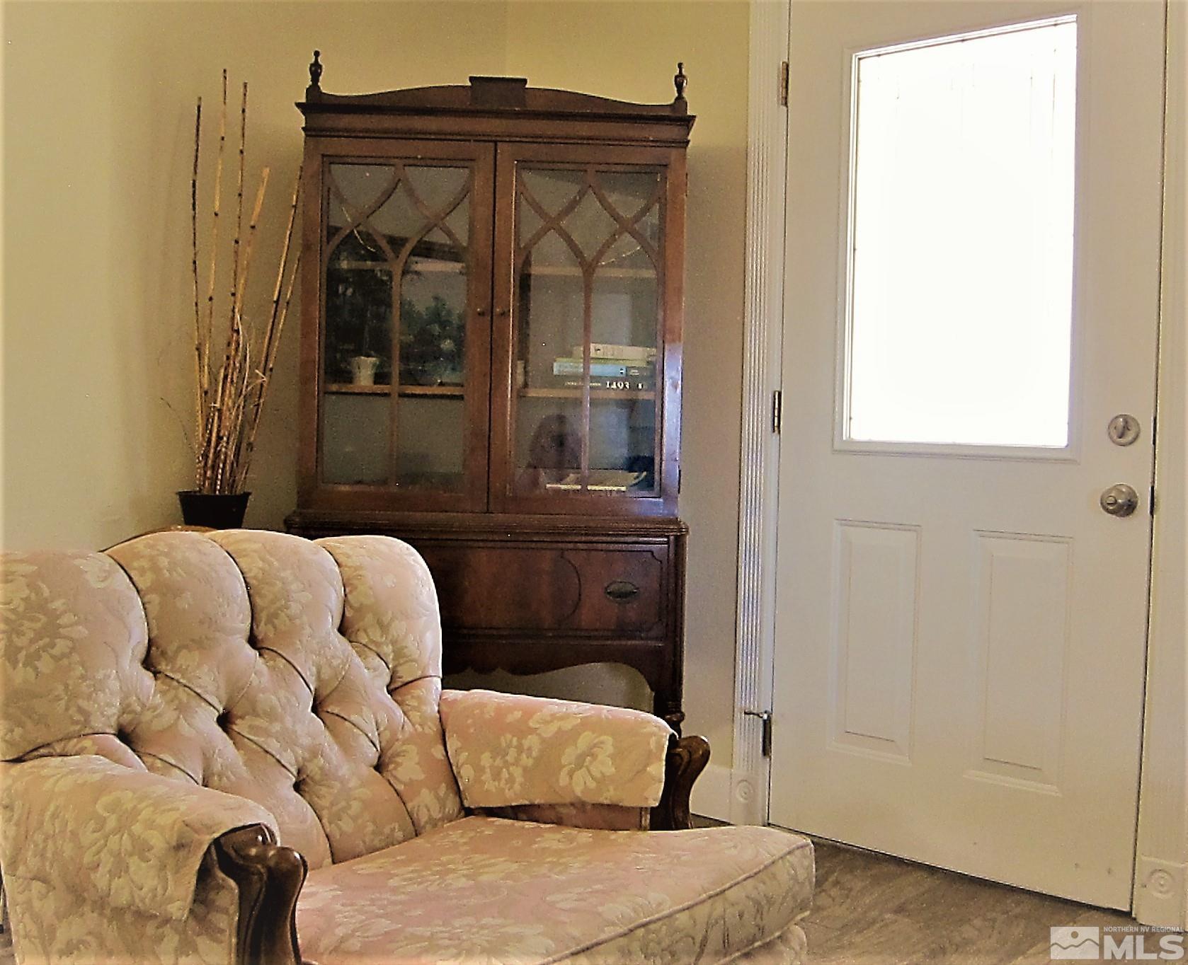 16770 Mt Rose Highway, Unit A & B Reno, NV 89511 - Photo 18 of 40 a living room with a couch and dresser