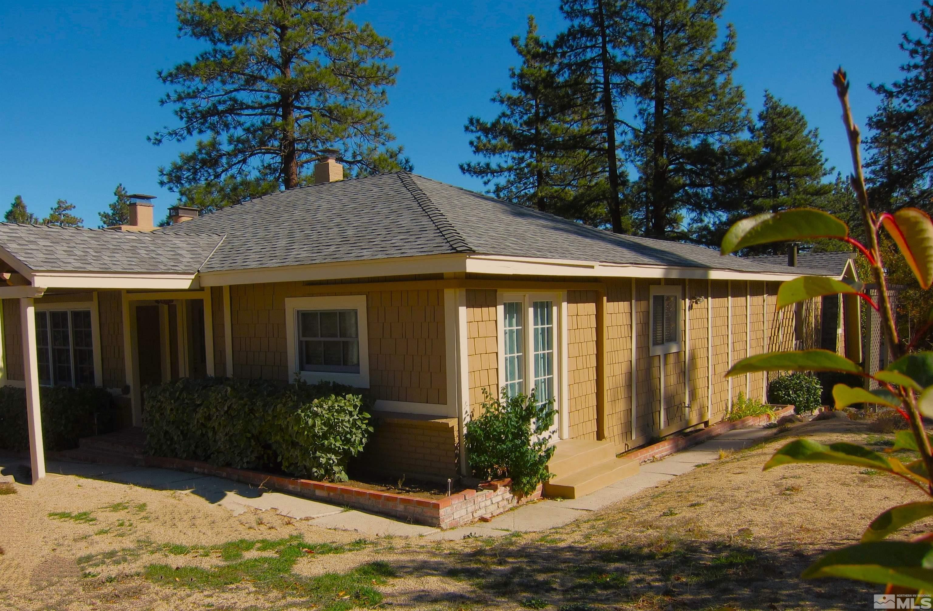 16770 Mt Rose Highway, Unit A & B Reno, NV 89511 - Photo 36 of 40 a view of a house with backyard porch and sitting area