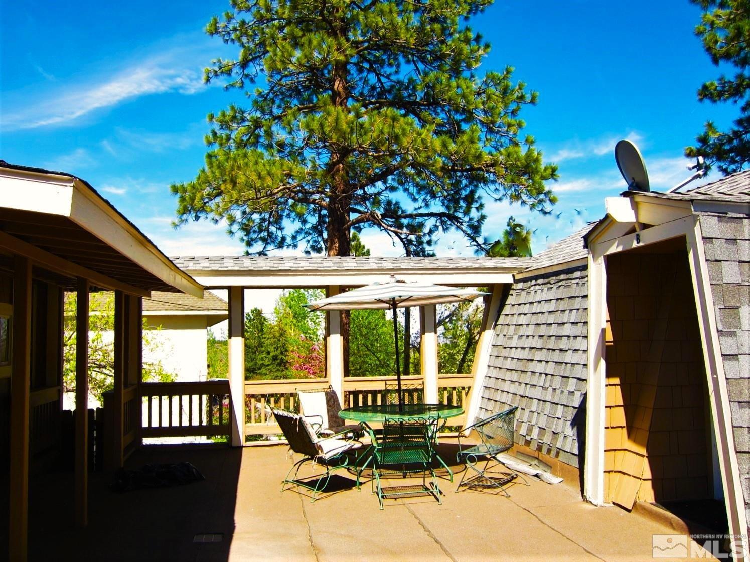 16770 Mt Rose Highway, Unit A & B Reno, NV 89511 - Photo 37 of 40 a balcony with chairs