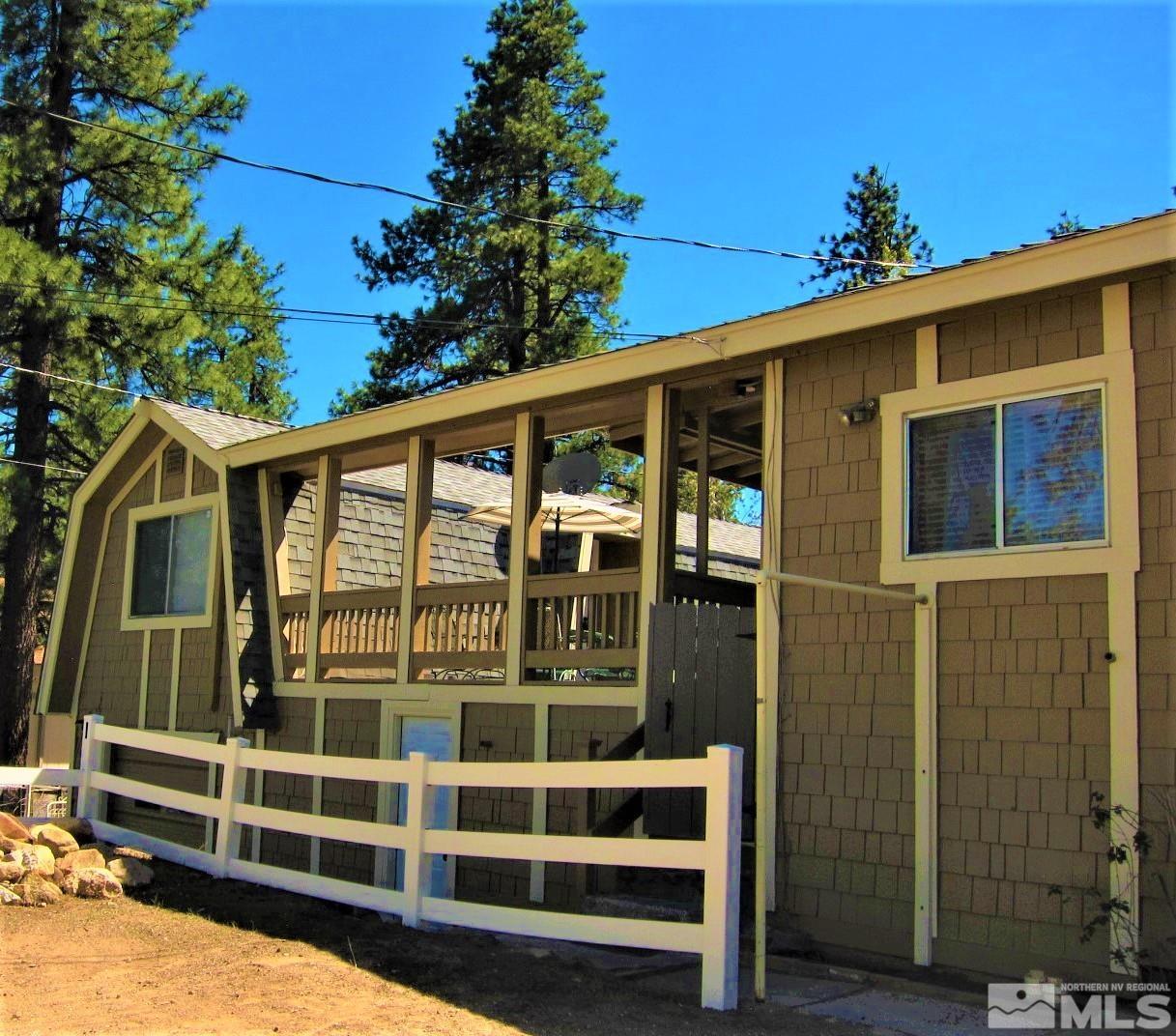 16770 Mt Rose Highway, Unit A & B Reno, NV 89511 - Photo 5 of 40 a front view of a house with a balcony