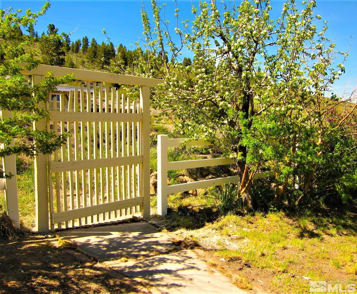 16770 Mt Rose Highway, Unit A & B Reno, NV 89511 - Photo 6 of 40 a view of a building with a yard