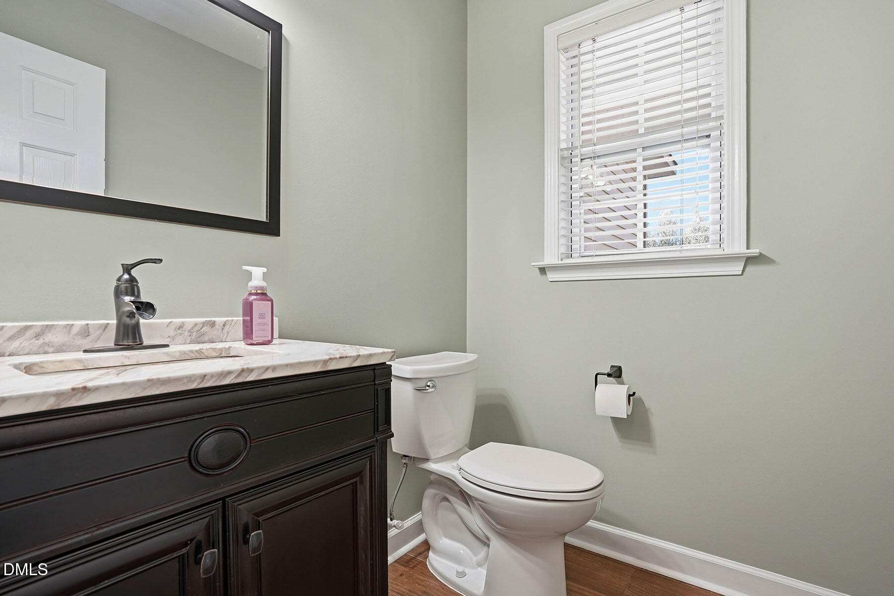 90 Spring Leaf Lane Wendell, NC 27591 - Photo 14 of 37 a bathroom with a granite countertop sink toilet and a mirror