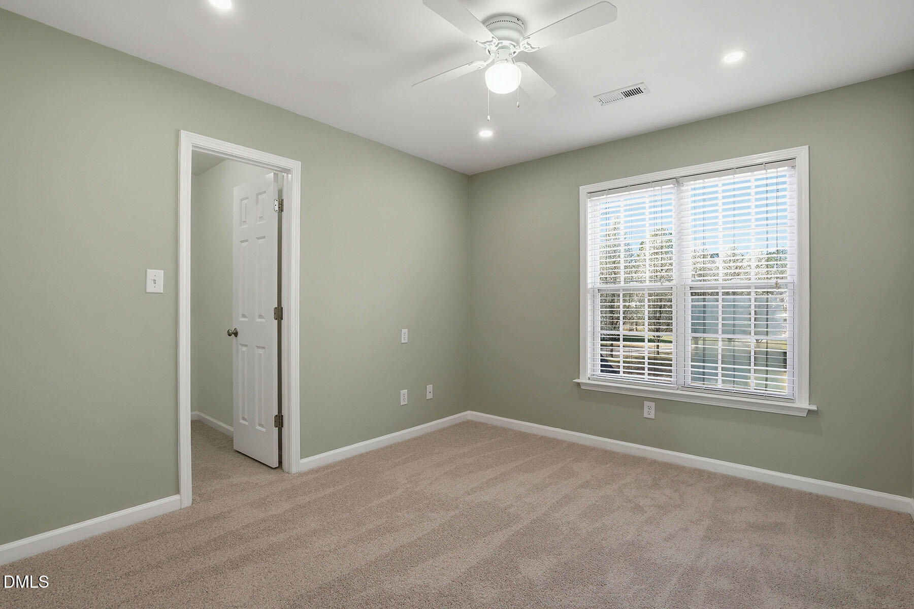 90 Spring Leaf Lane Wendell, NC 27591 - Photo 22 of 37 a view of an empty room with a window