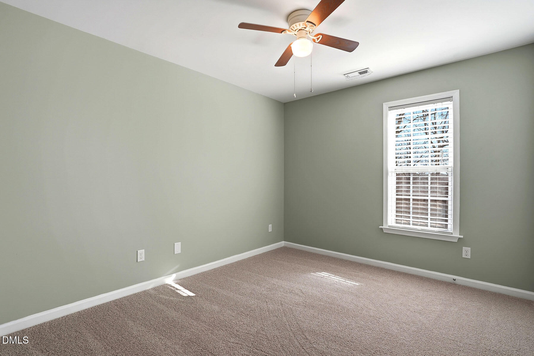 90 Spring Leaf Lane Wendell, NC 27591 - Photo 23 of 37 an empty room with windows and fan