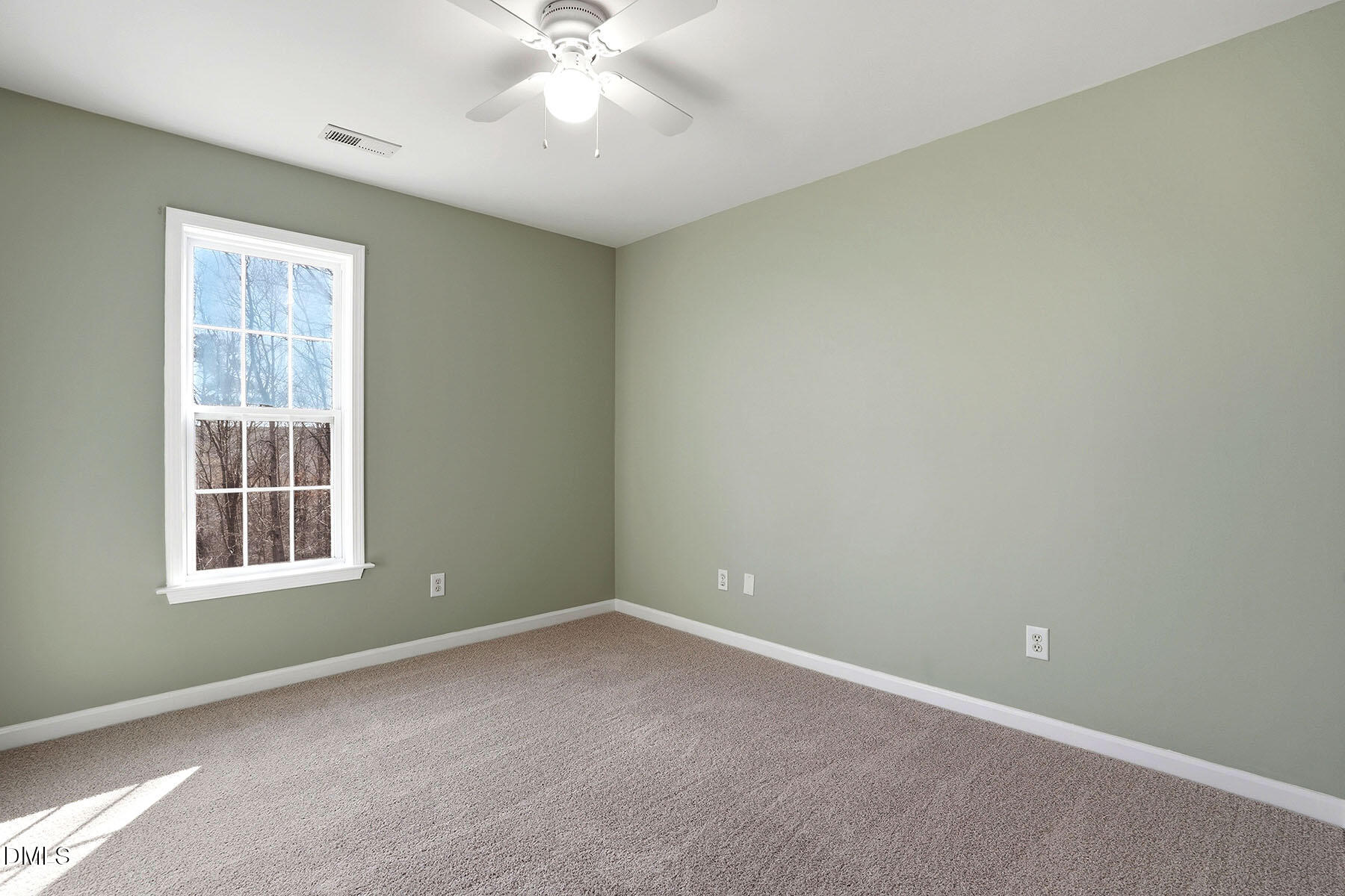 90 Spring Leaf Lane Wendell, NC 27591 - Photo 25 of 37 an empty room with windows and fan