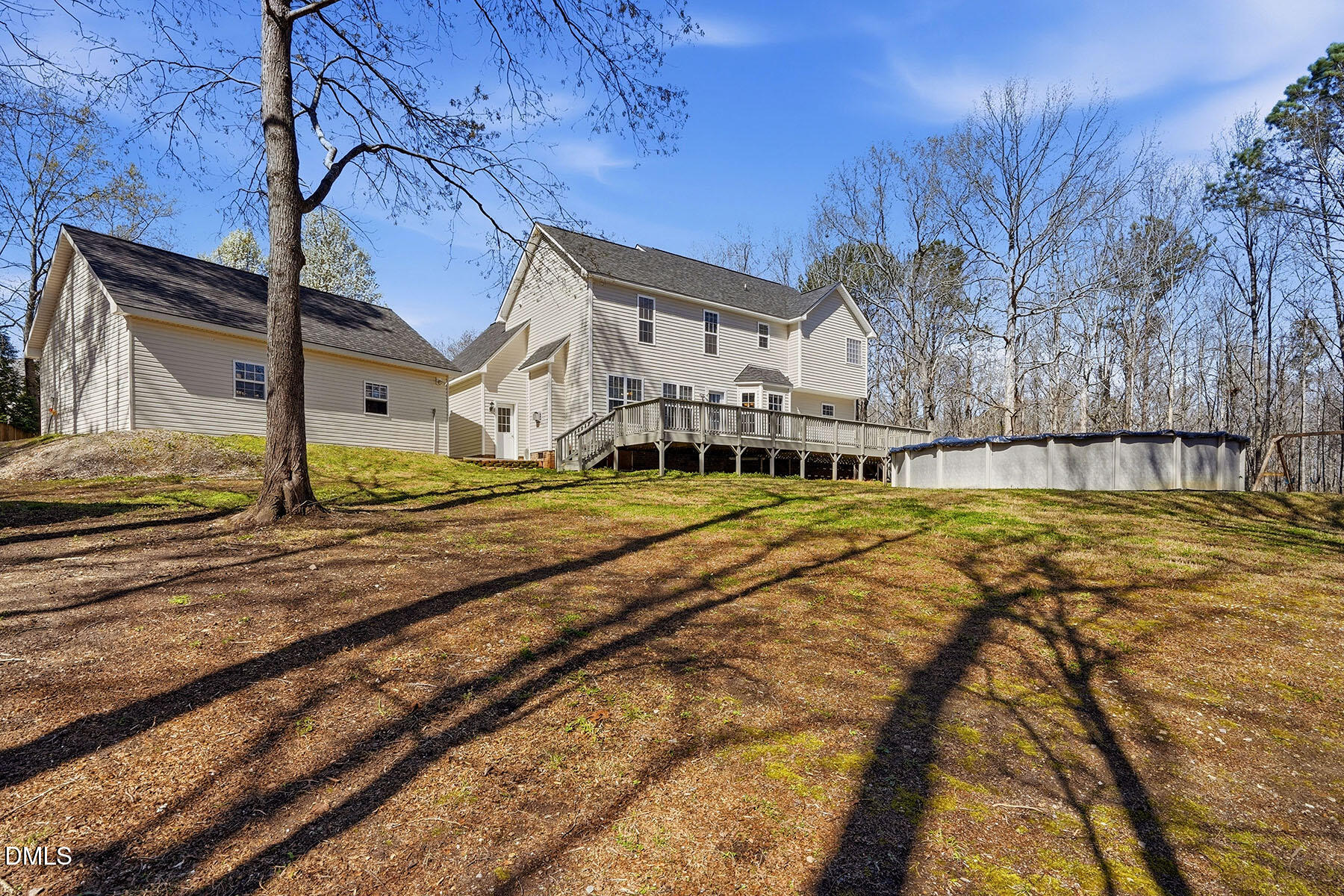 90 Spring Leaf Lane Wendell, NC 27591 - Photo 31 of 37 a house with trees in front of it