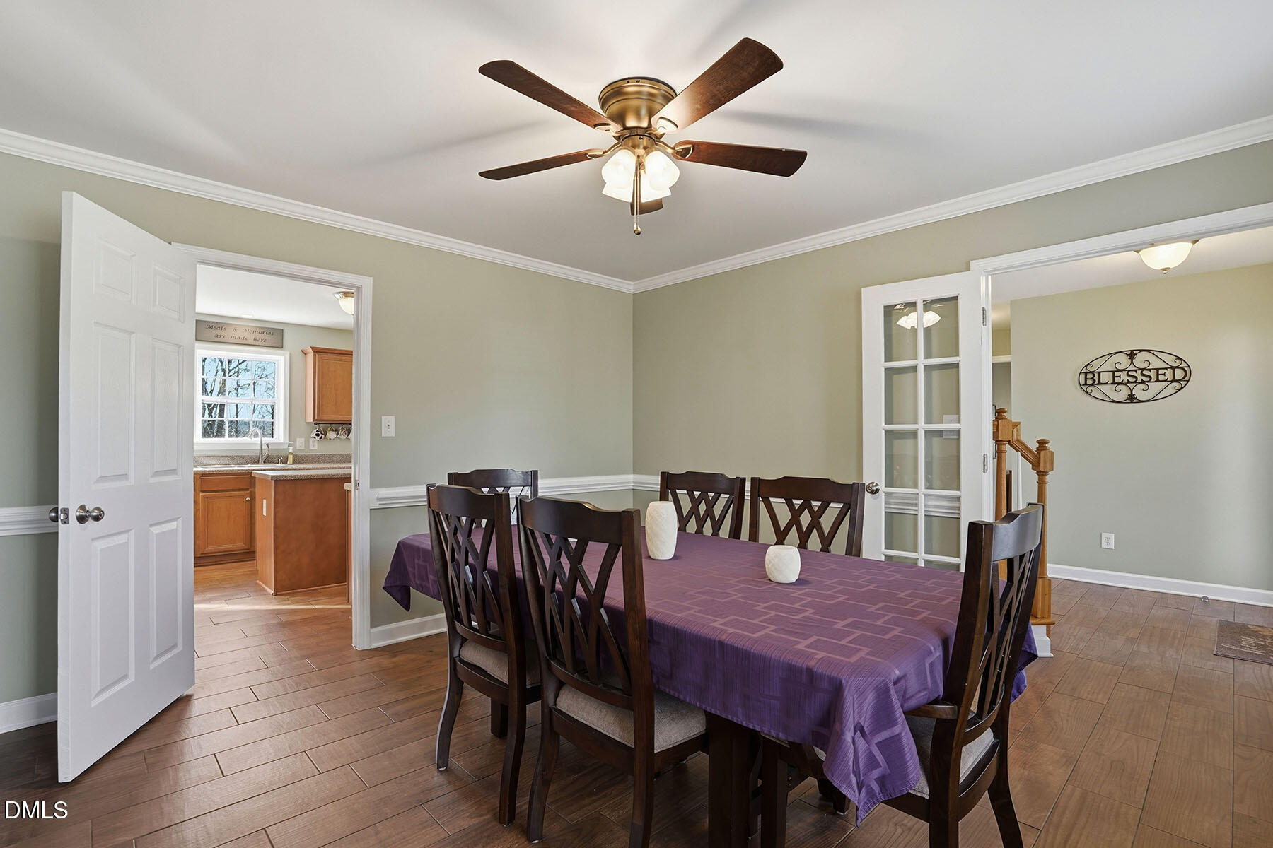 90 Spring Leaf Lane Wendell, NC 27591 - Photo 6 of 37 a view of a dining room with furniture and wooden floor