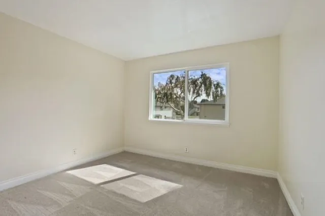 an empty room with a window