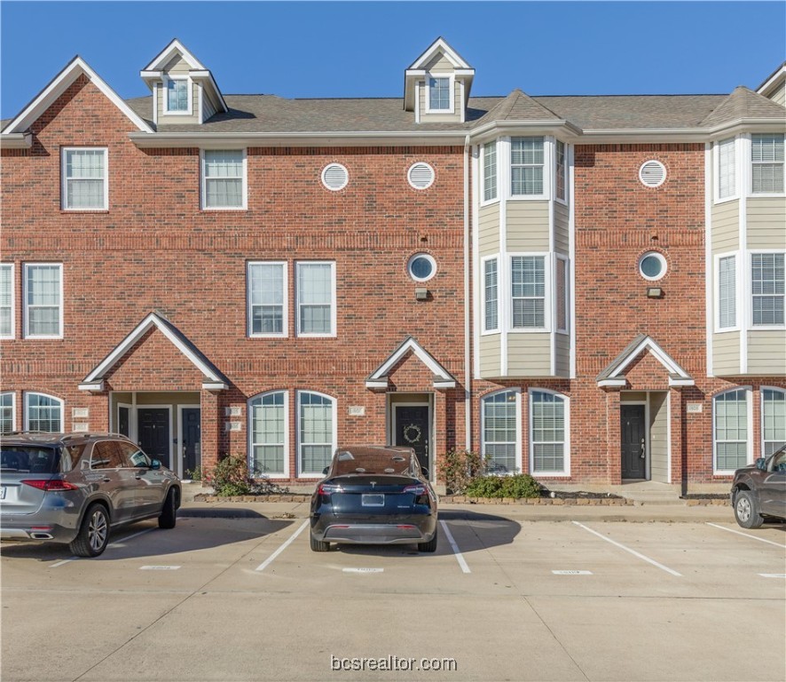 1198 Jones-Butler Road, Unit 1807 College Station, TX 77840 - Photo 9 of 24 a front view of a house with parking space