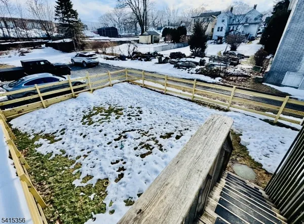 a view of swimming pool with outdoor seating