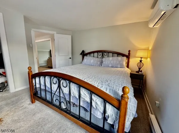 a view of a living room and a wooden floor